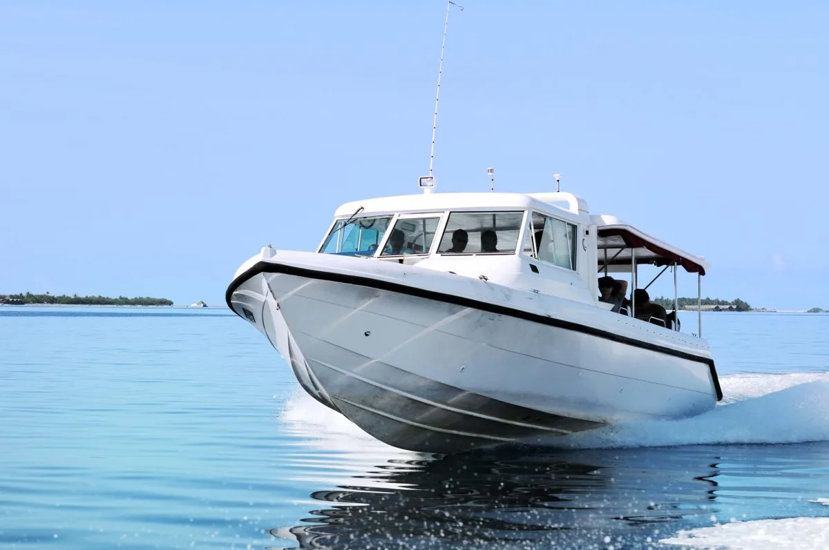 Powerboat cruising on calm open water