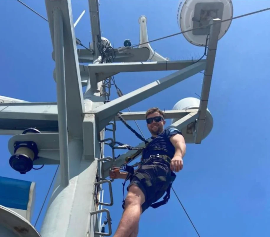 Lumacon engineer working at the masthead installing marine electronics